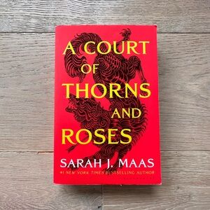 A Court Of Thorns And Roses by Sarah J. Maas